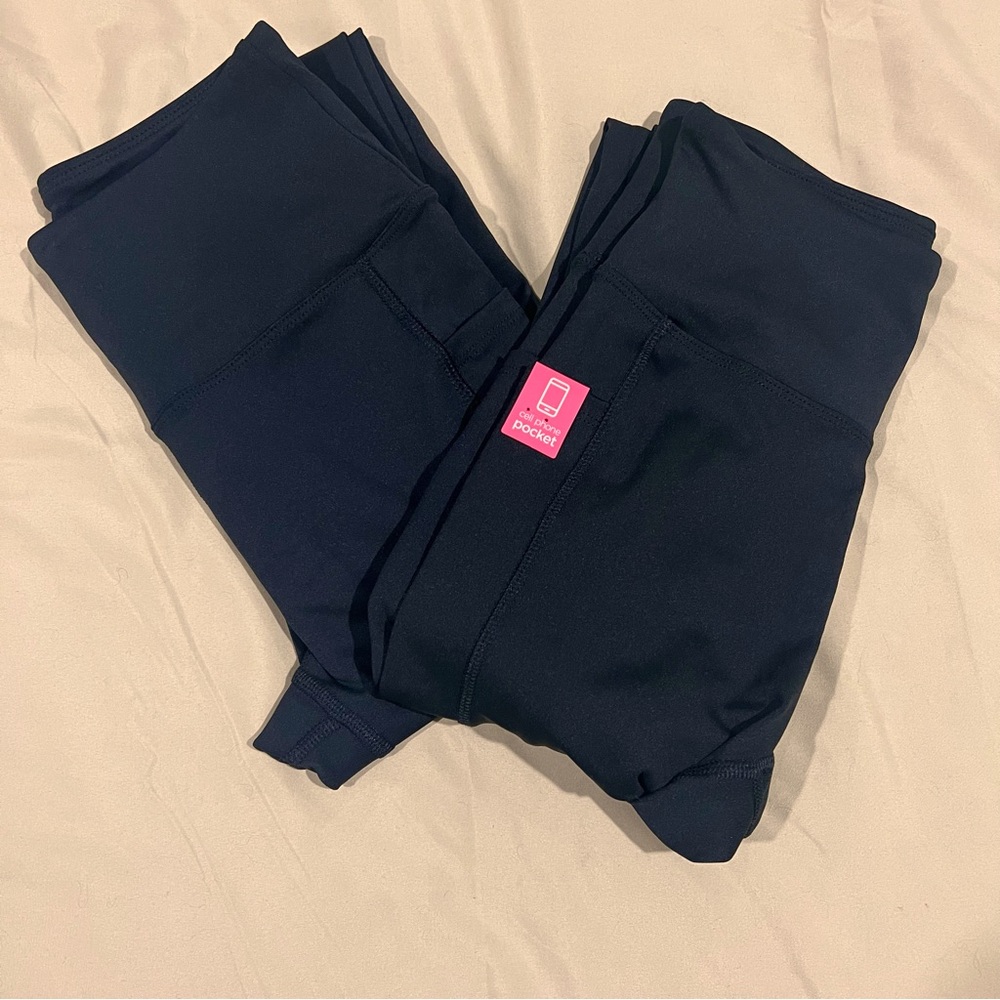 Pair of black Marika’s size S 25” track pants. 2 for $30